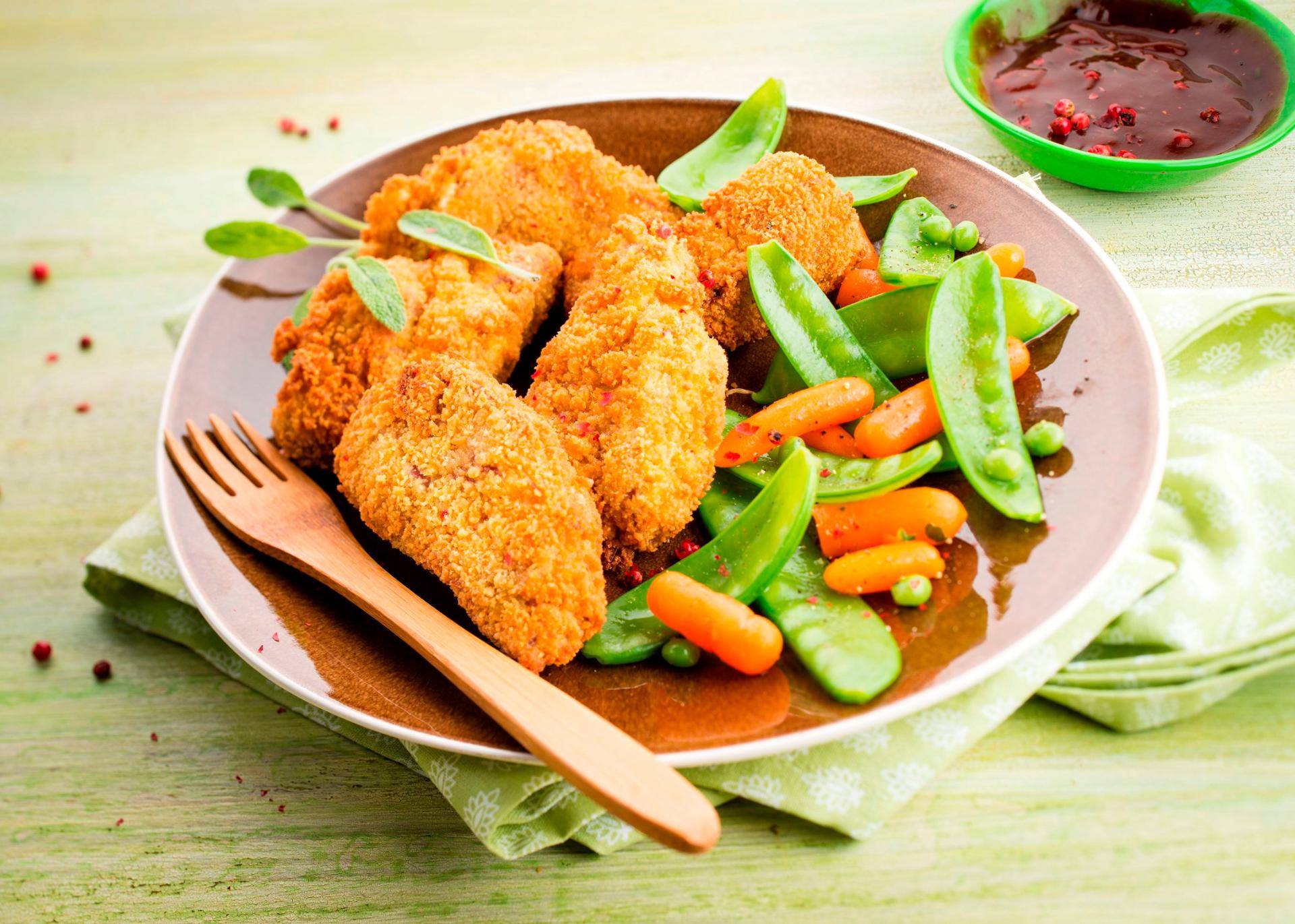 Paniertes Schweinefleisch - Rezepte Actifry Genius | Tefal